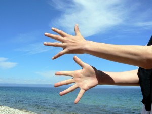 Hands and Beach Setting