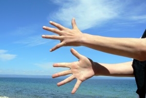 Hands and Beach Setting